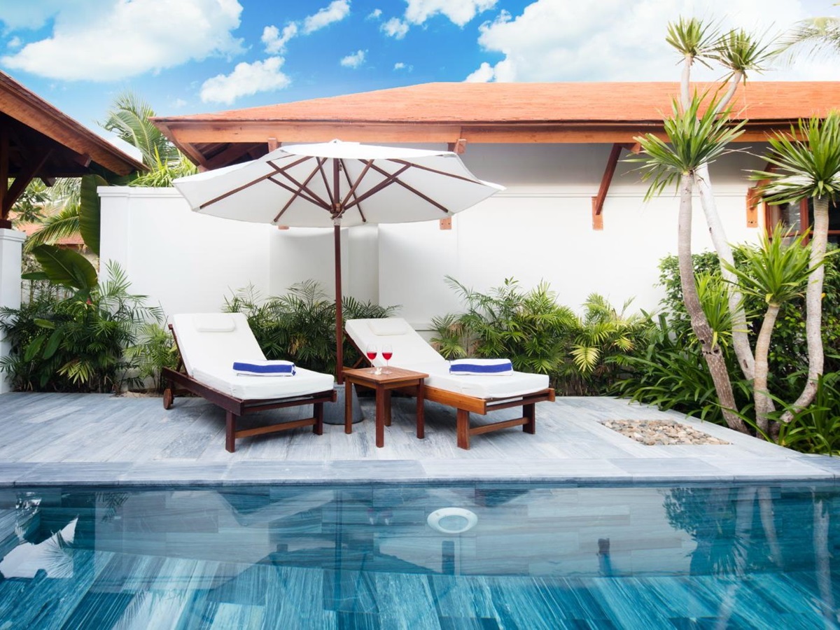 Private villa pool sunbeds at The Anam resort in Cam Ranh, Vietnam
