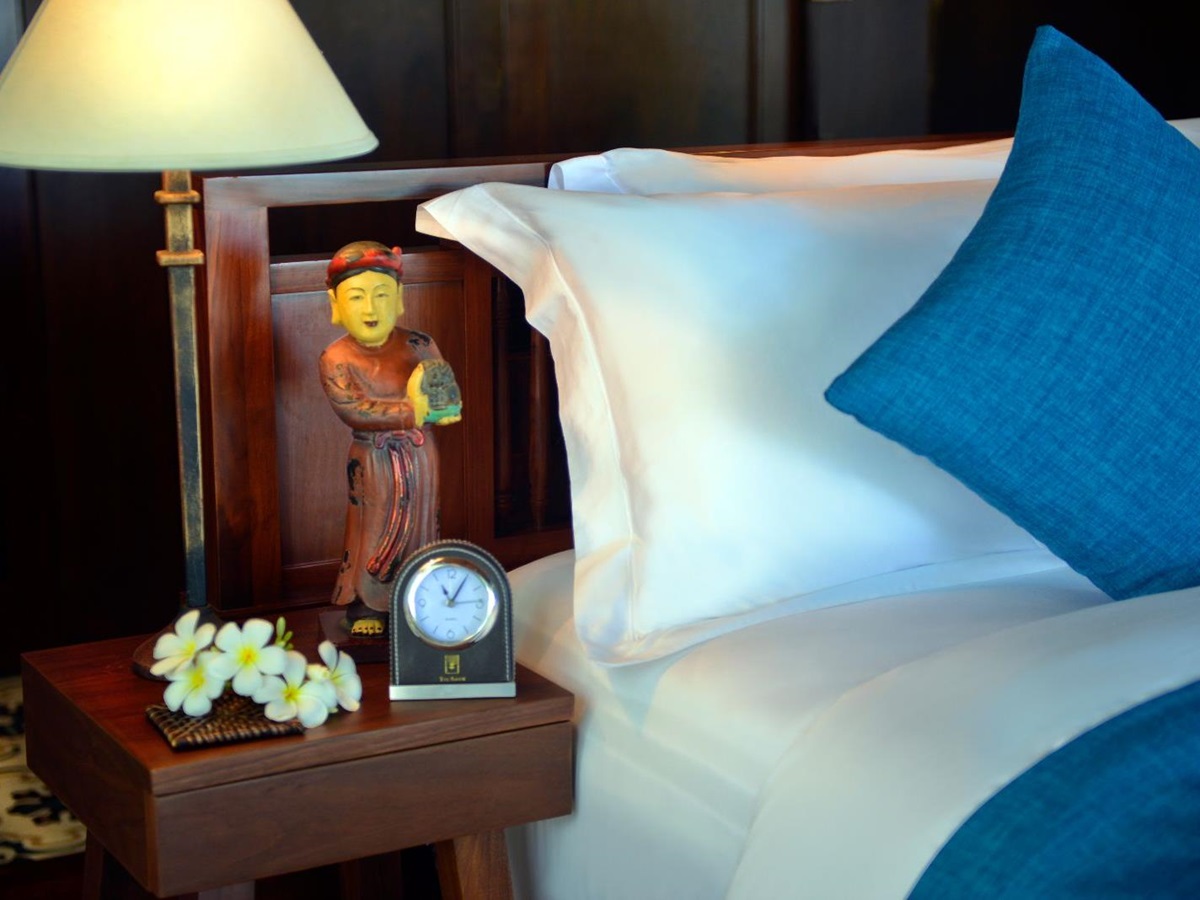 Bedside table in a private villa at The Anam resort in Cam Ranh, Vietnam