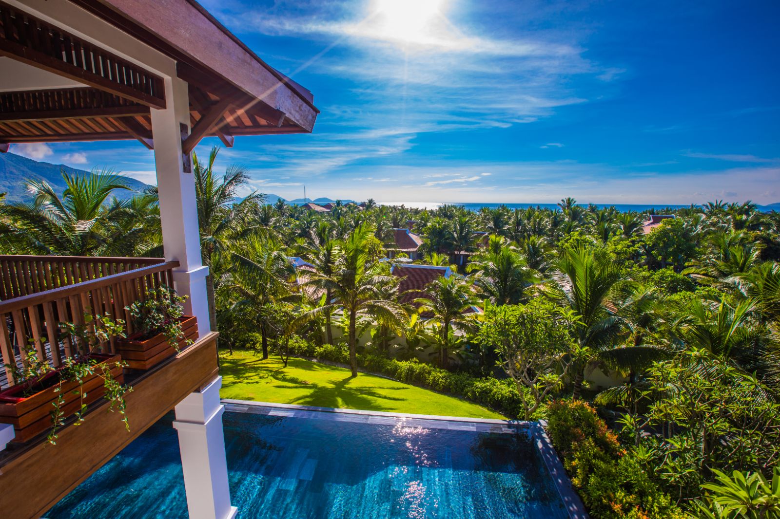 Villa balcony decking and view of resort at The Anam resort in Cam Ranh, Vietnam