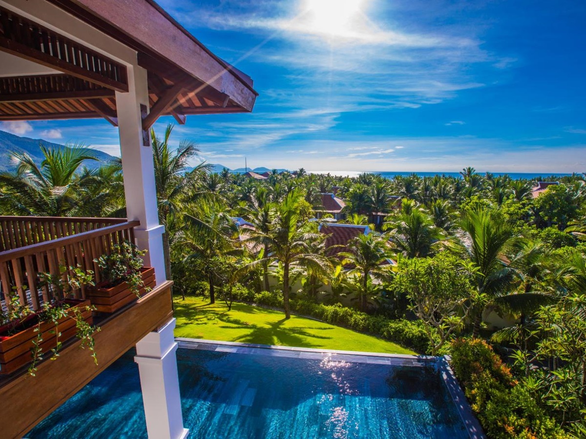 Villa balcony decking and view of resort at The Anam resort in Cam Ranh, Vietnam