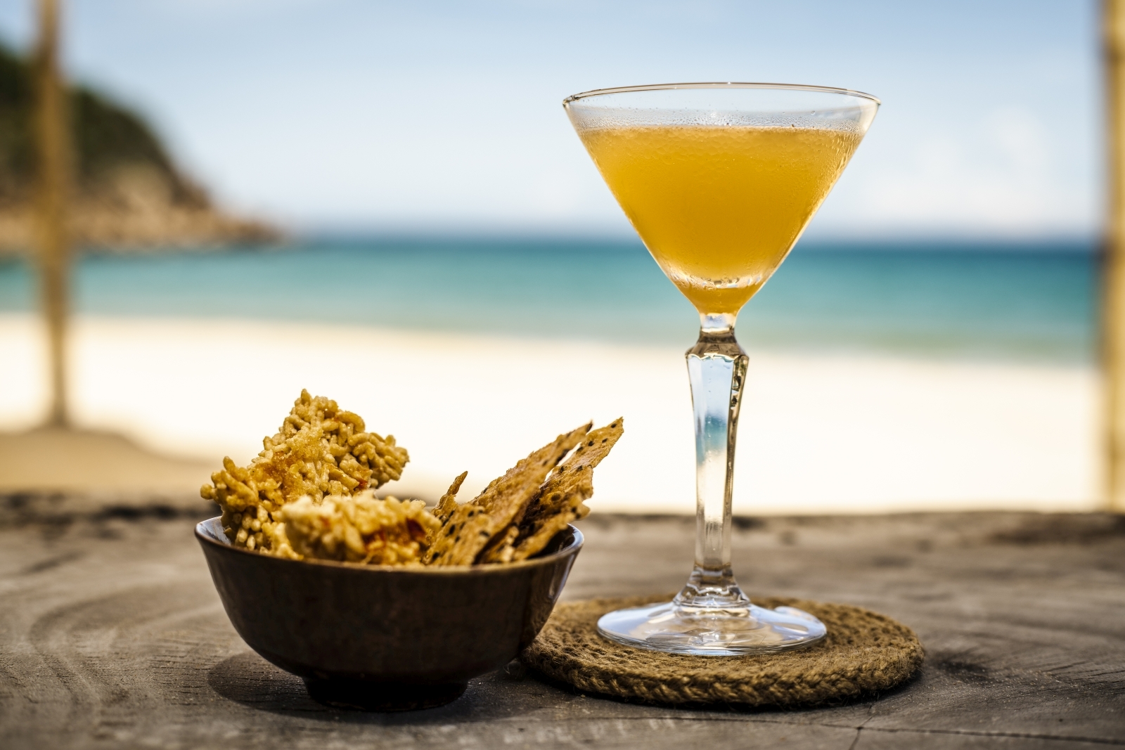 Cocktails on the beach at luxury resort Zannier Bai San Ho in Vietnam