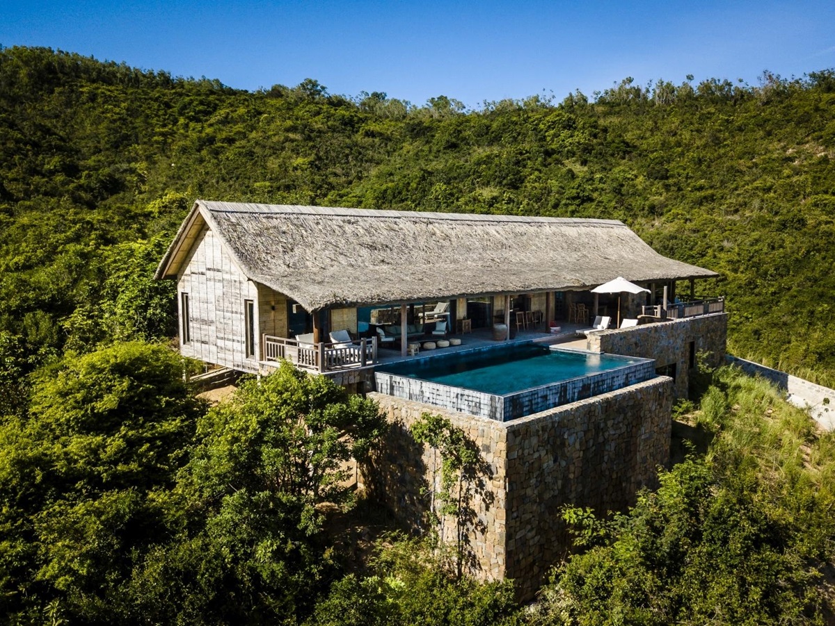 Exterior of a Grand Bay Pool Villa with private pool and plenty of shaded outdoor space at luxury resort Zannier Bai San Ho in Vietnam
