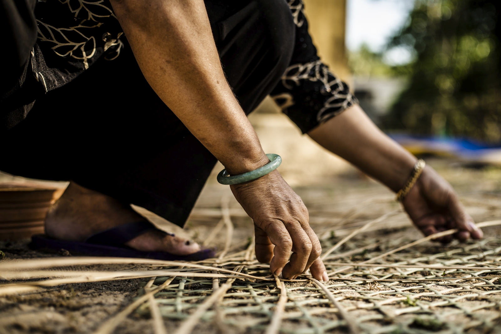 Local women weaving at luxury resort Zannier Bai San Ho in Vietnam