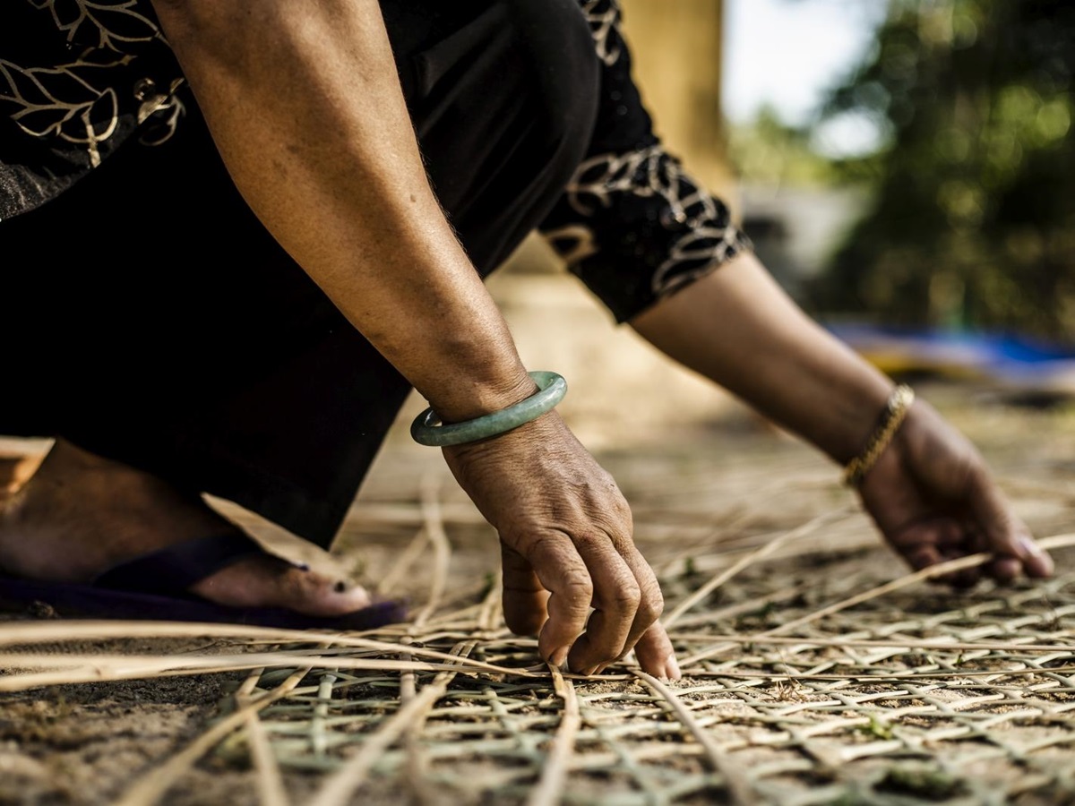 Local women weaving at luxury resort Zannier Bai San Ho in Vietnam
