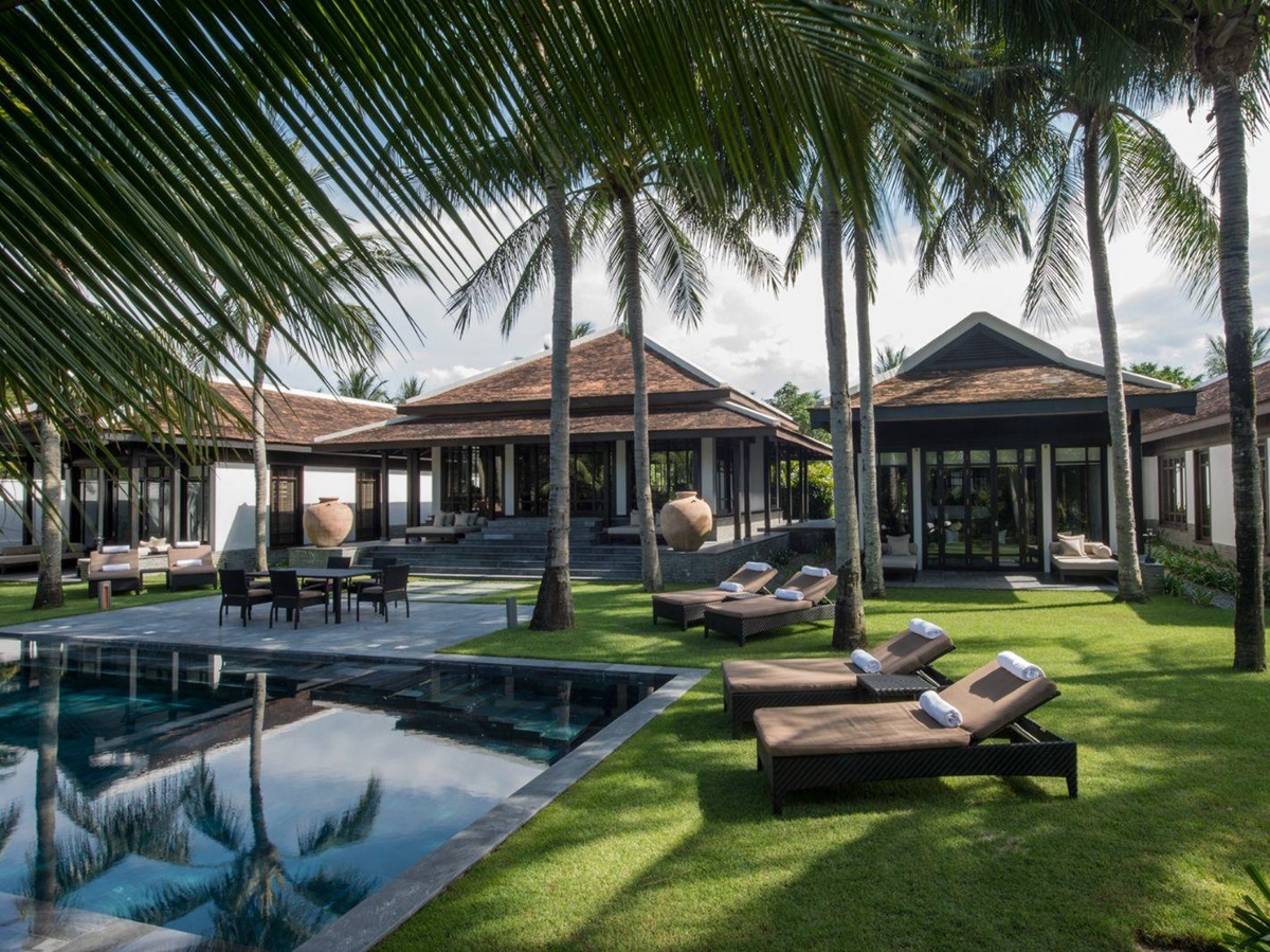 Exterior view of a pool and three bedroom hilltop villa