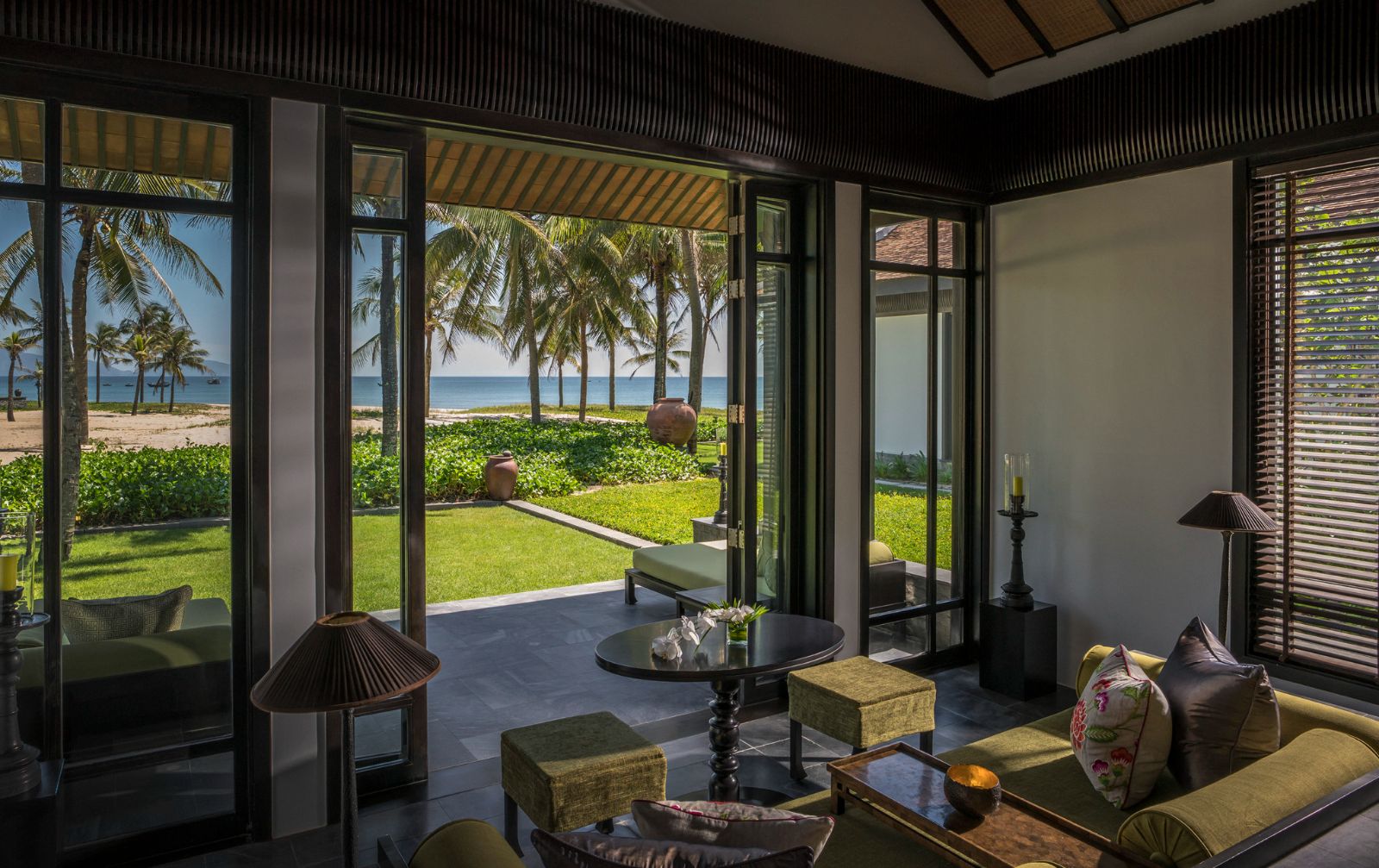 Lounge area of a garden villa at luxury resort Four seasons Nam Hai 