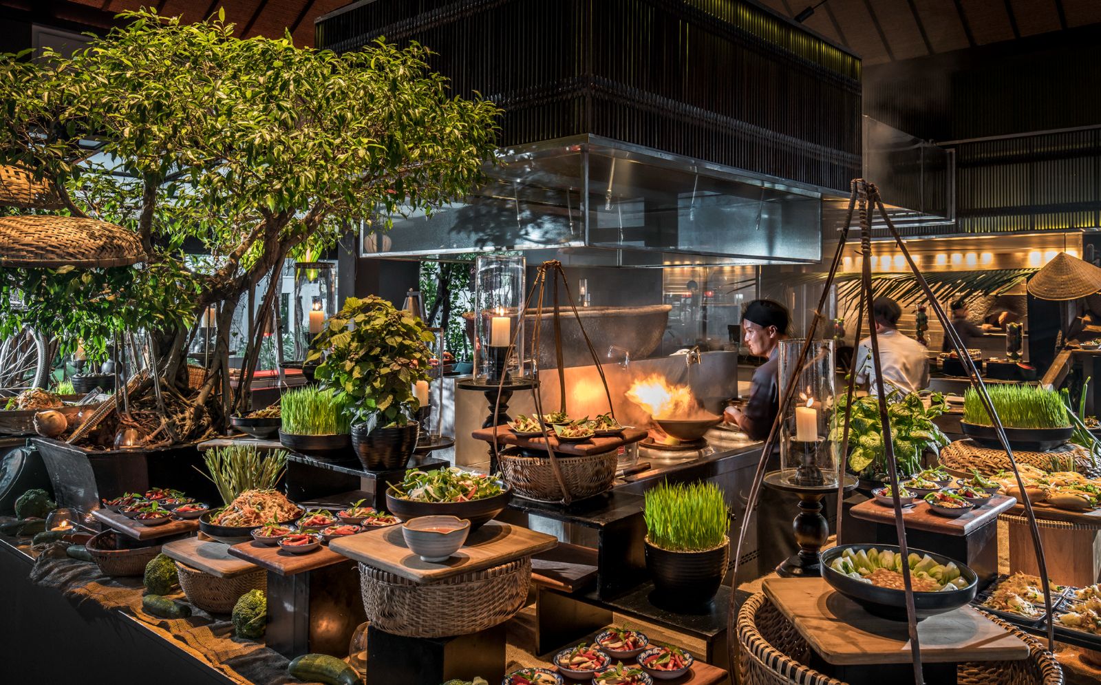 Open kitchen surrounds by fresh vegetables at luxury resort Four seasons Nam Hai 