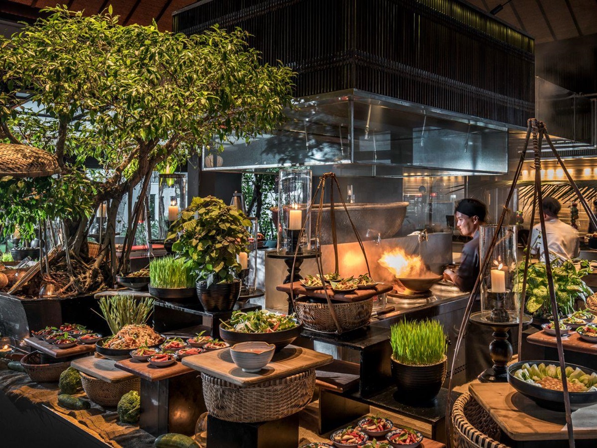 Open kitchen surrounds by fresh vegetables at luxury resort Four seasons Nam Hai