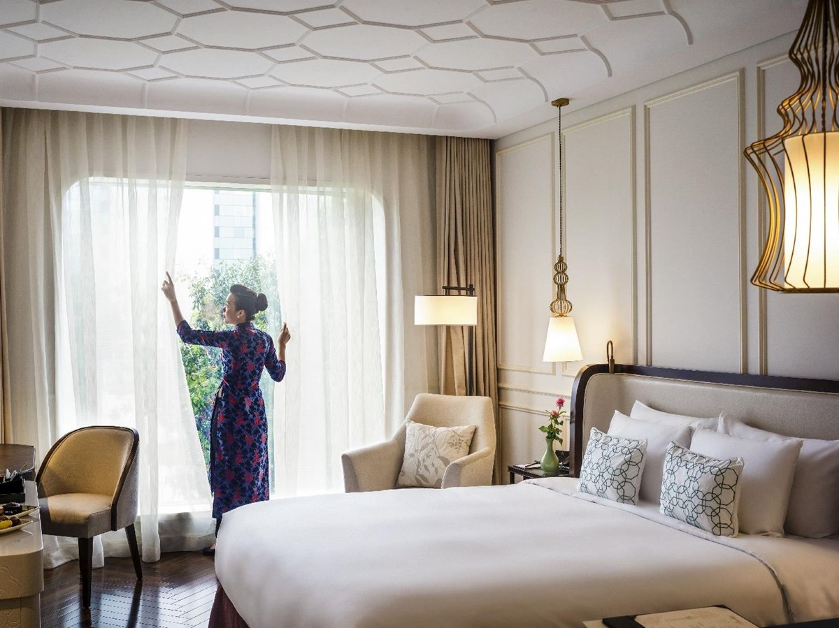 Comfortable guest room at Hotel des Arts Saigon in Vietnam