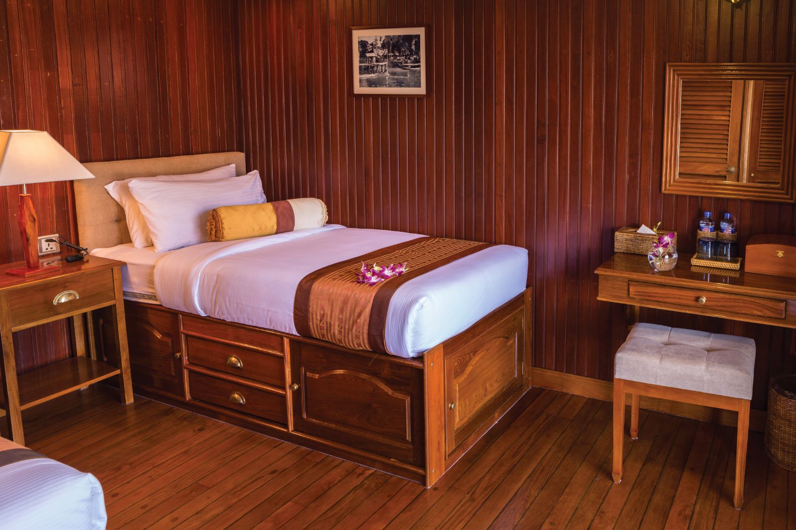 Twin cabin bed onboard the RV Mekong Pandaw in Vietnam