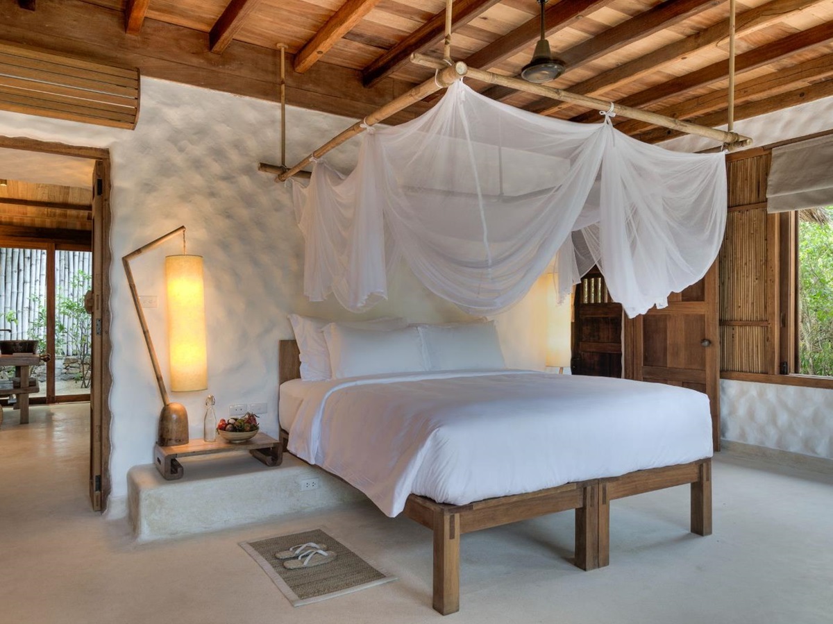 Bedroom in a Beachfront pool villa at luxury resort Six Senses Ninh Van Bay