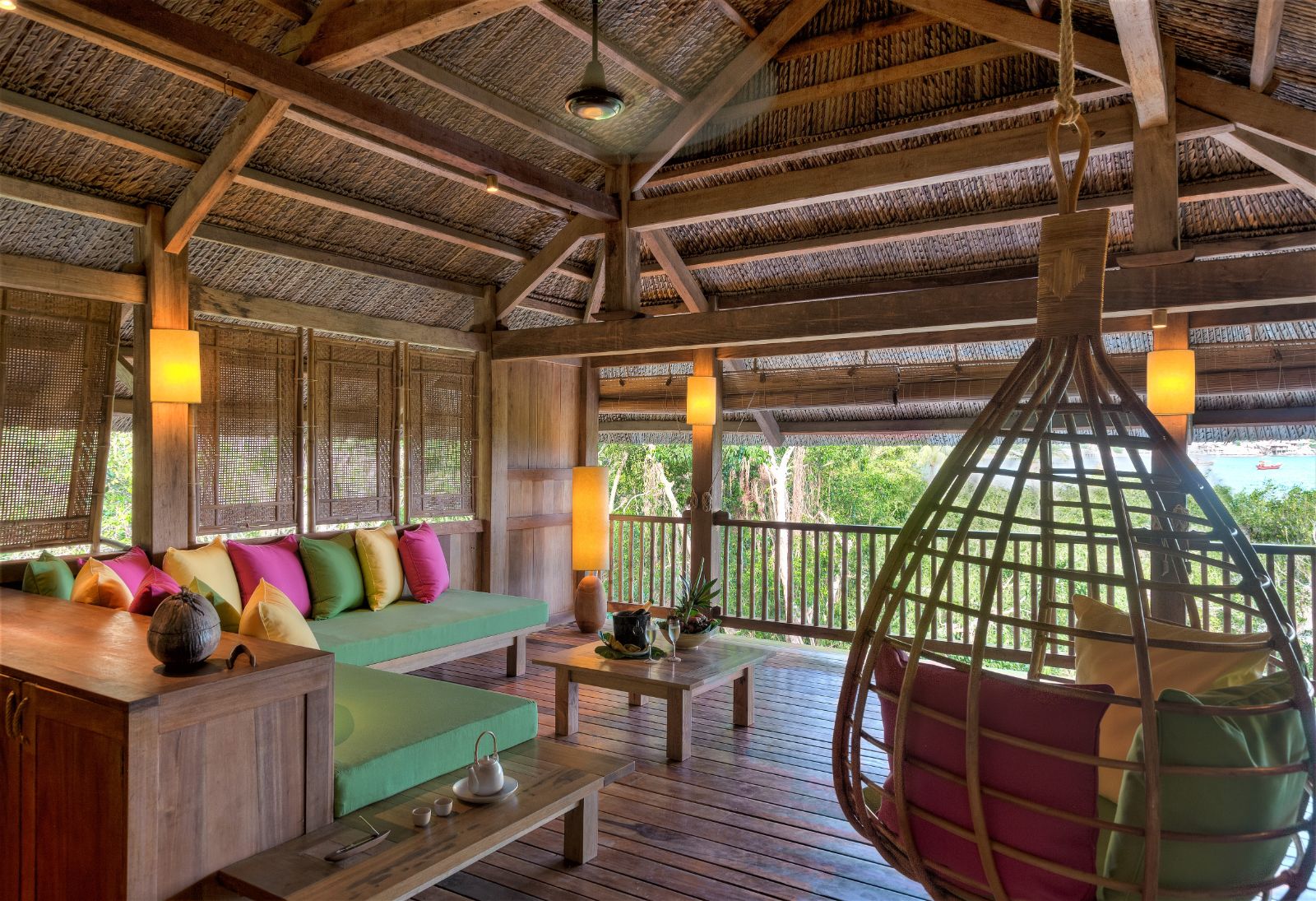 Upper floor seating area in a beachfront pool villa at luxury resort Six Senses Ninh Van Bay