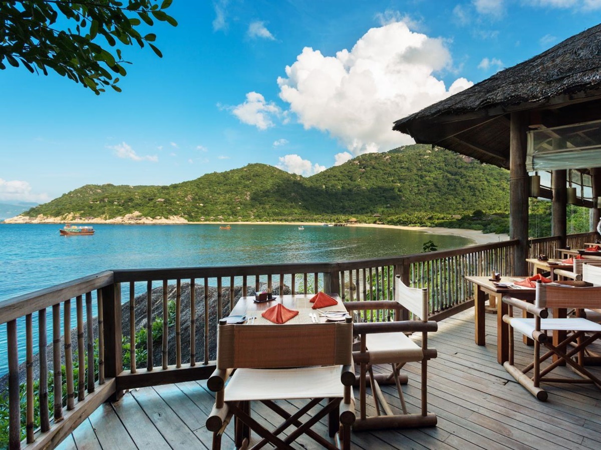 Dining by the bay restaurant at luxury resort Six Senses Ninh Van Bay