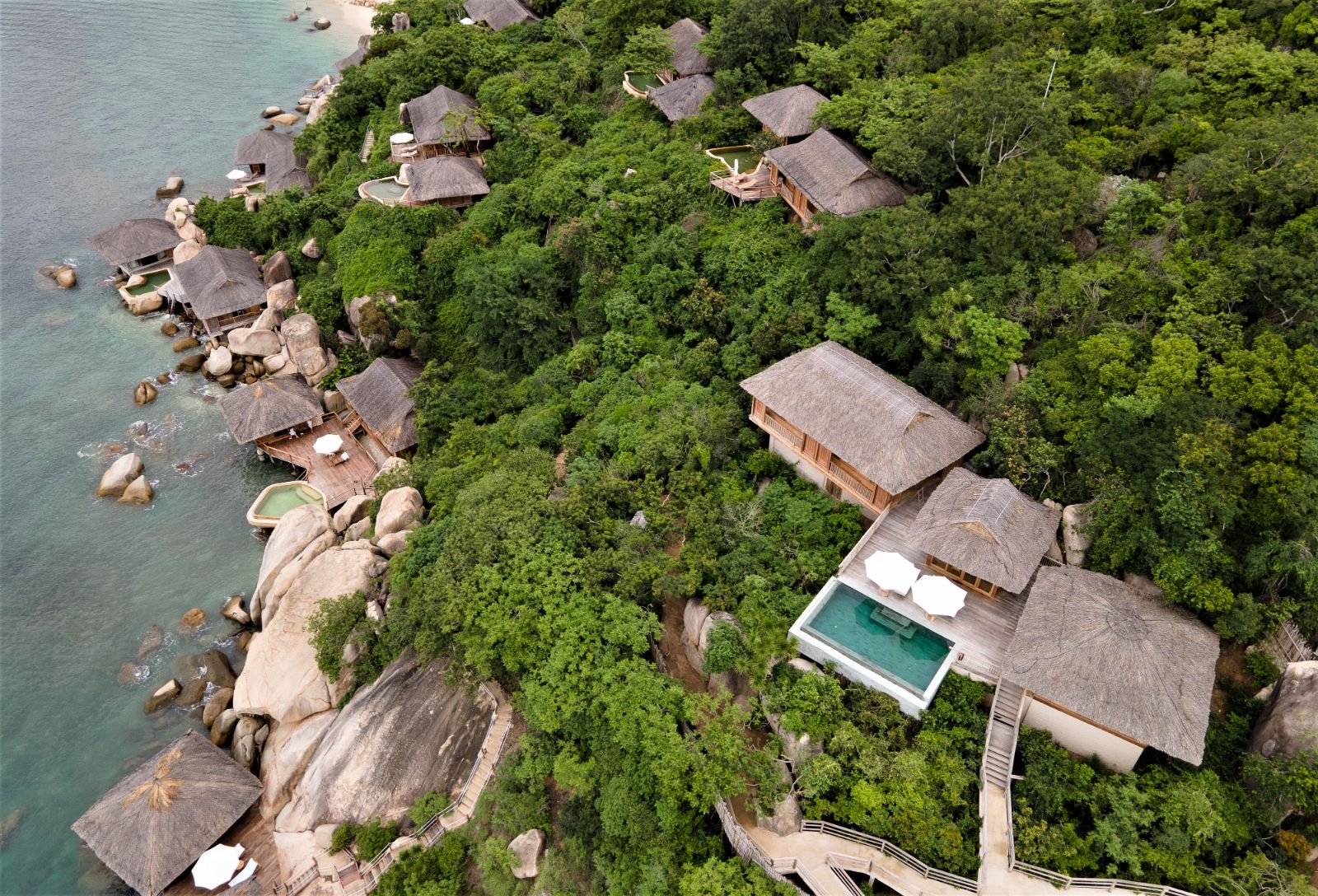 Aerial view of of the hilltop pool villas at luxury resort Six Senses Ninh Van Bay