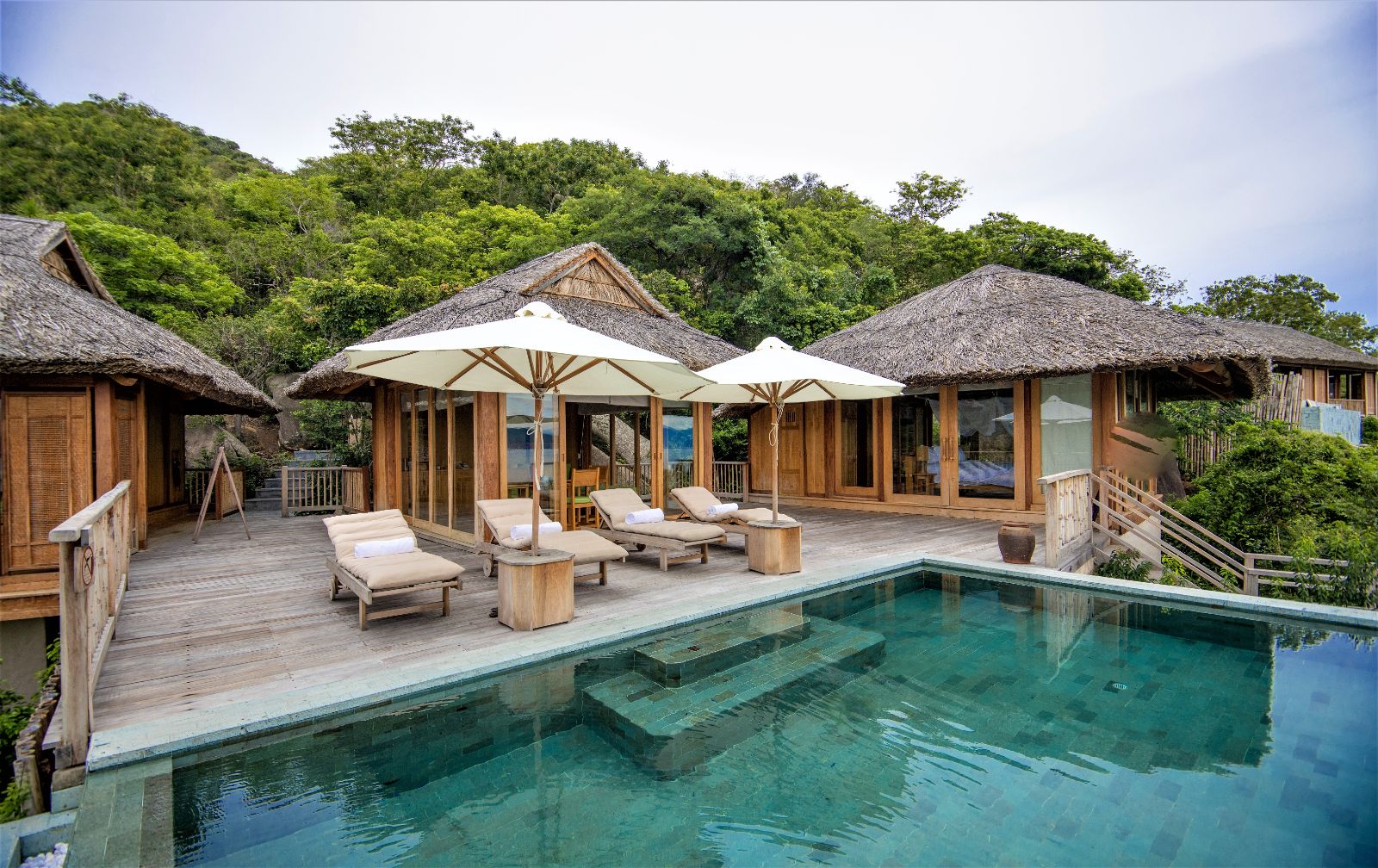 Terrace and pool area with an exterior view of a hilltop pool villa at luxury resort Six Senses Ninh Van Bay