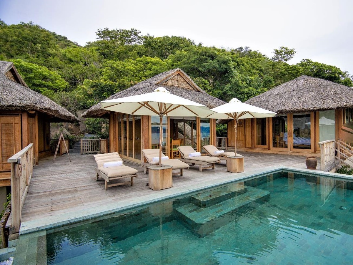 Terrace and pool area with an exterior view of a hilltop pool villa at luxury resort Six Senses Ninh Van Bay