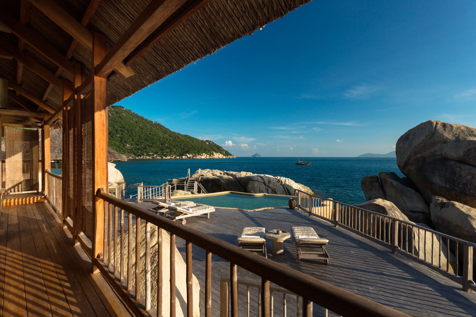 Outdoor terrace area at luxury resort Six Senses Ninh Van Bay