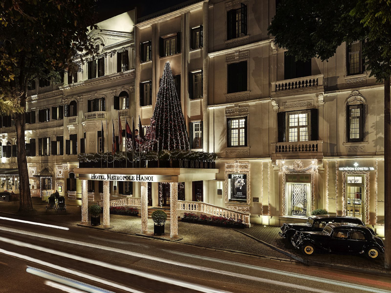 The exterior of the Sofitel Legend Metropole Hanoi by night
