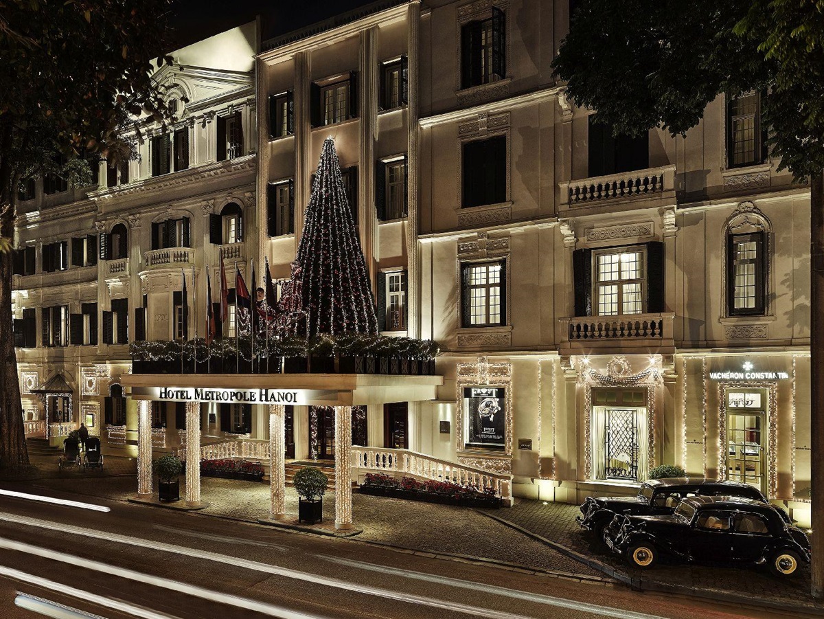 The exterior of the Sofitel Legend Metropole Hanoi by night