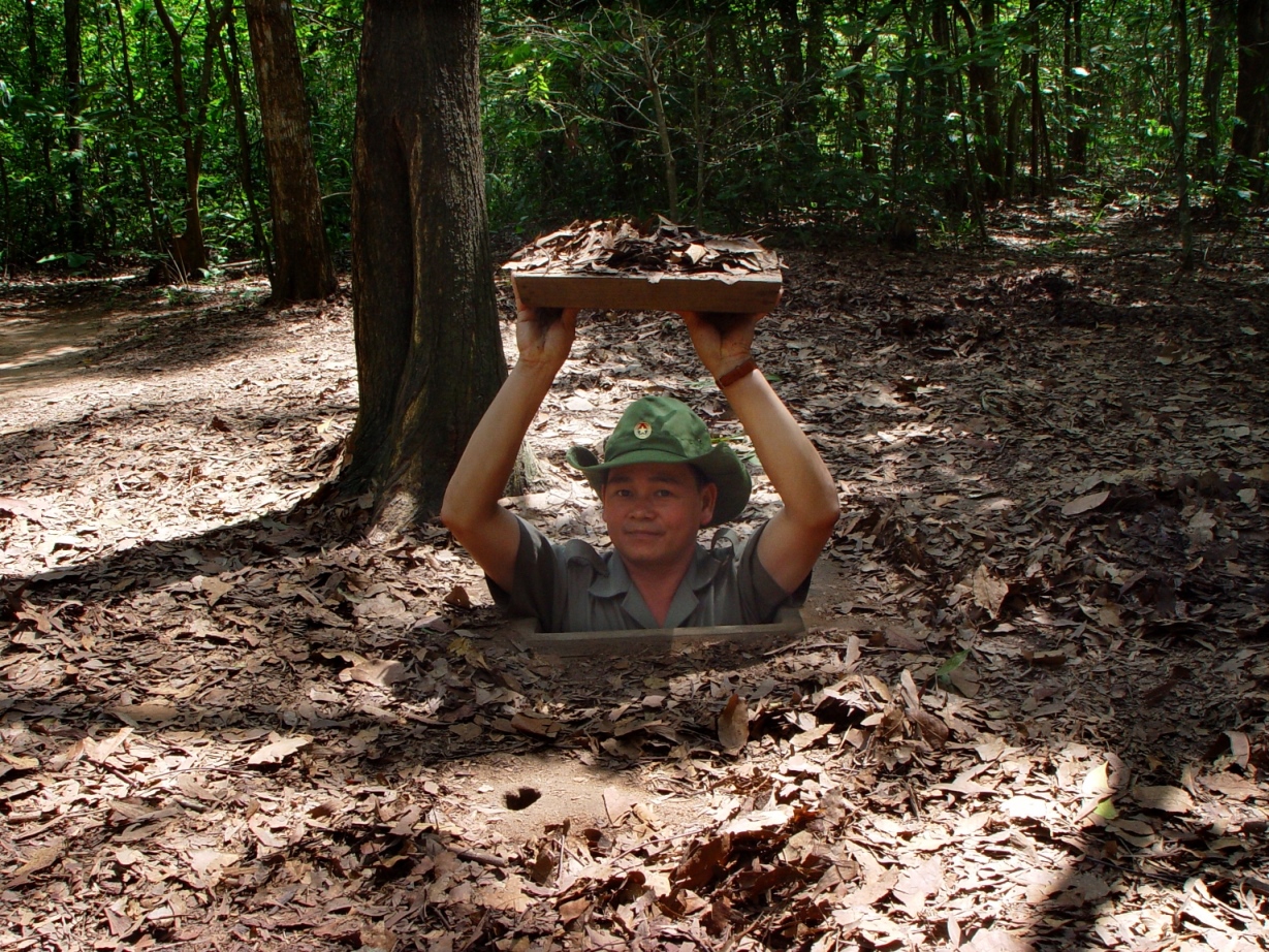 Man emerging from the Cu Chi tunnels