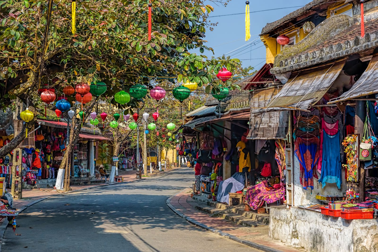Stalls on the colourful streets of Hoi An Vietnam