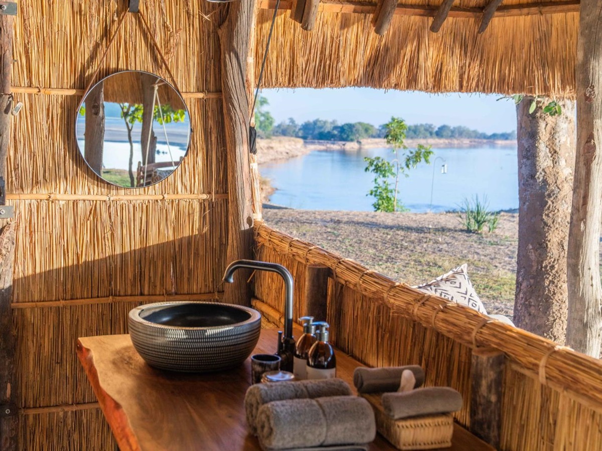 Bathroom with a view of the river at Kakuli Bush Camp in Zambia's South Luangwa National Park