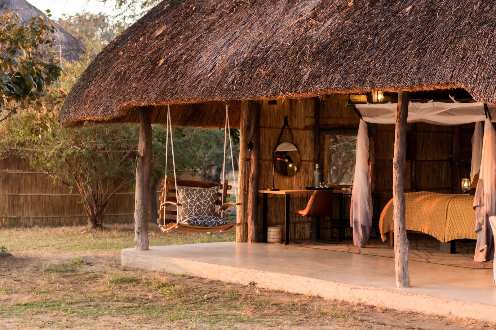 Swing on patio area of luxury chalet at Kakuli Bush Camp in Zambia's South Luangwa National Park