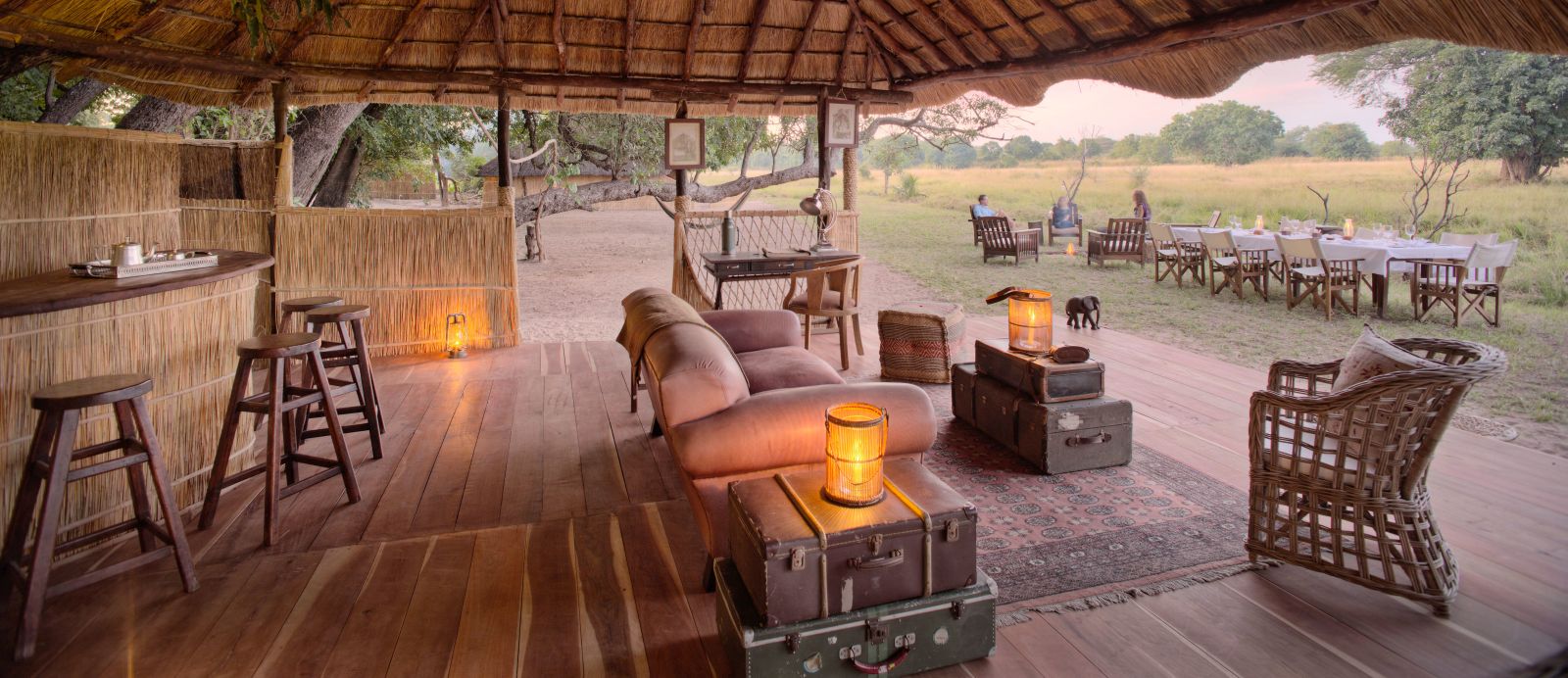 Main area with bar, lounge and dining at luxury safari camp Luwi Bush Camp in Zambia
