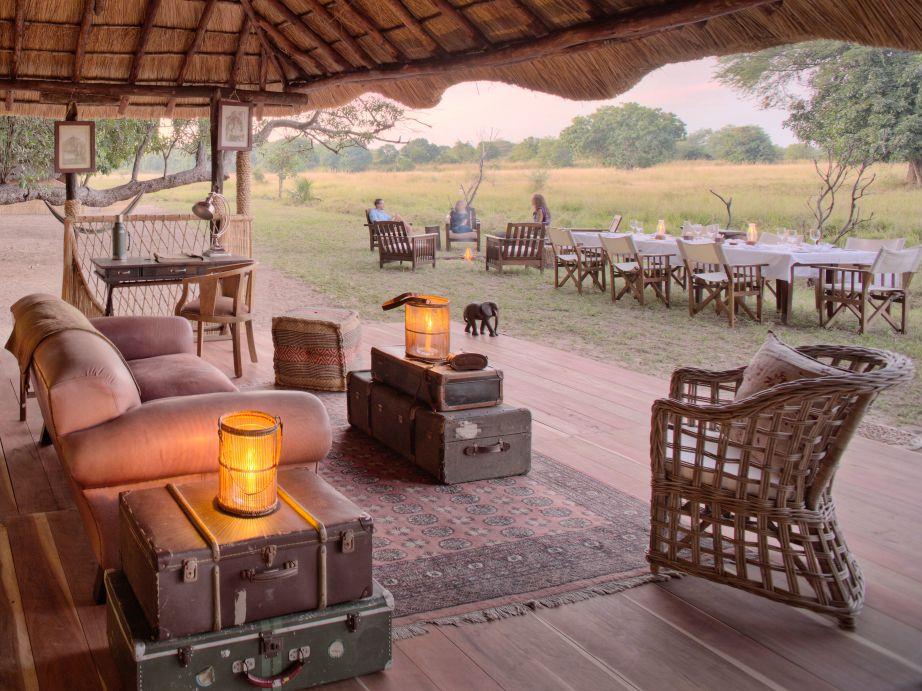Main area with bar, lounge and dining at luxury safari camp Luwi Bush Camp in Zambia