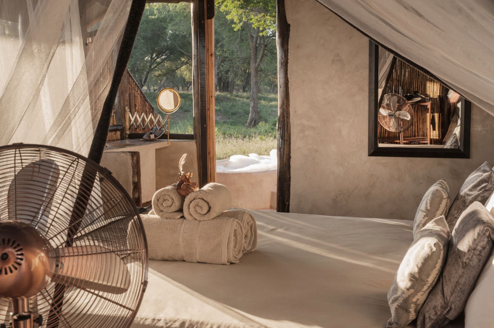 Guest bed at Old Mondoro in the Lower Zambezi National Park