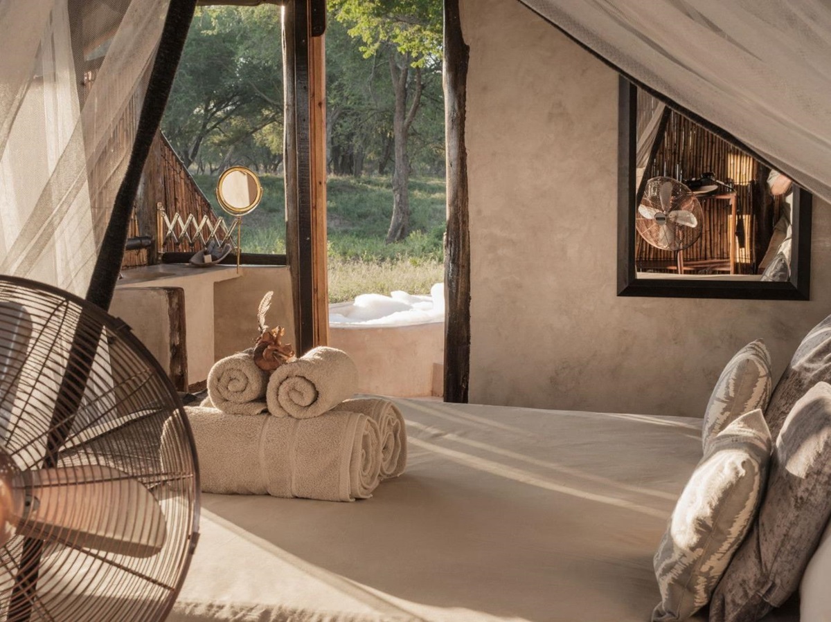 Guest bed at Old Mondoro in the Lower Zambezi National Park