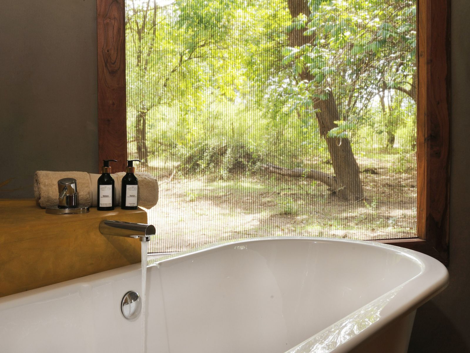 Bathroom of a guest tent at Potato Bush Camp on the Zambezi