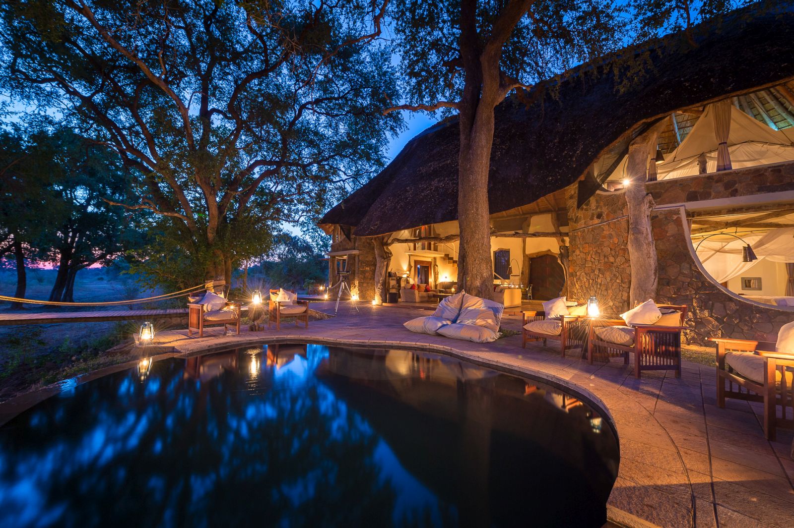 The Luangwa Safari House in Zambia illuminated by night