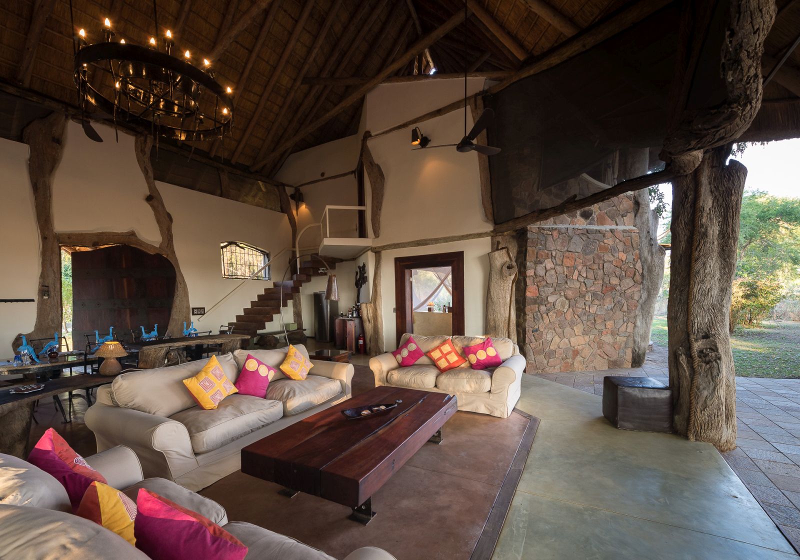 Open lounge looking out to the bush at the Luangwa Safari House in Zambia