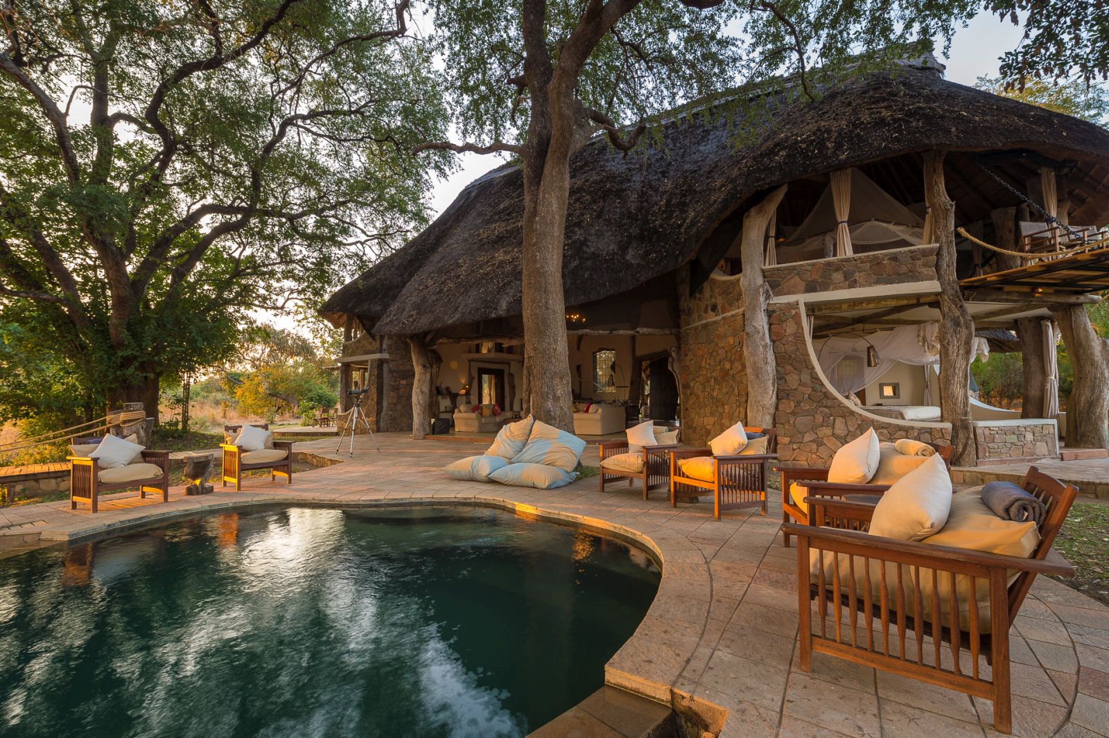 Swimming pool and terrace at the Luangwa Safari House in Zambia