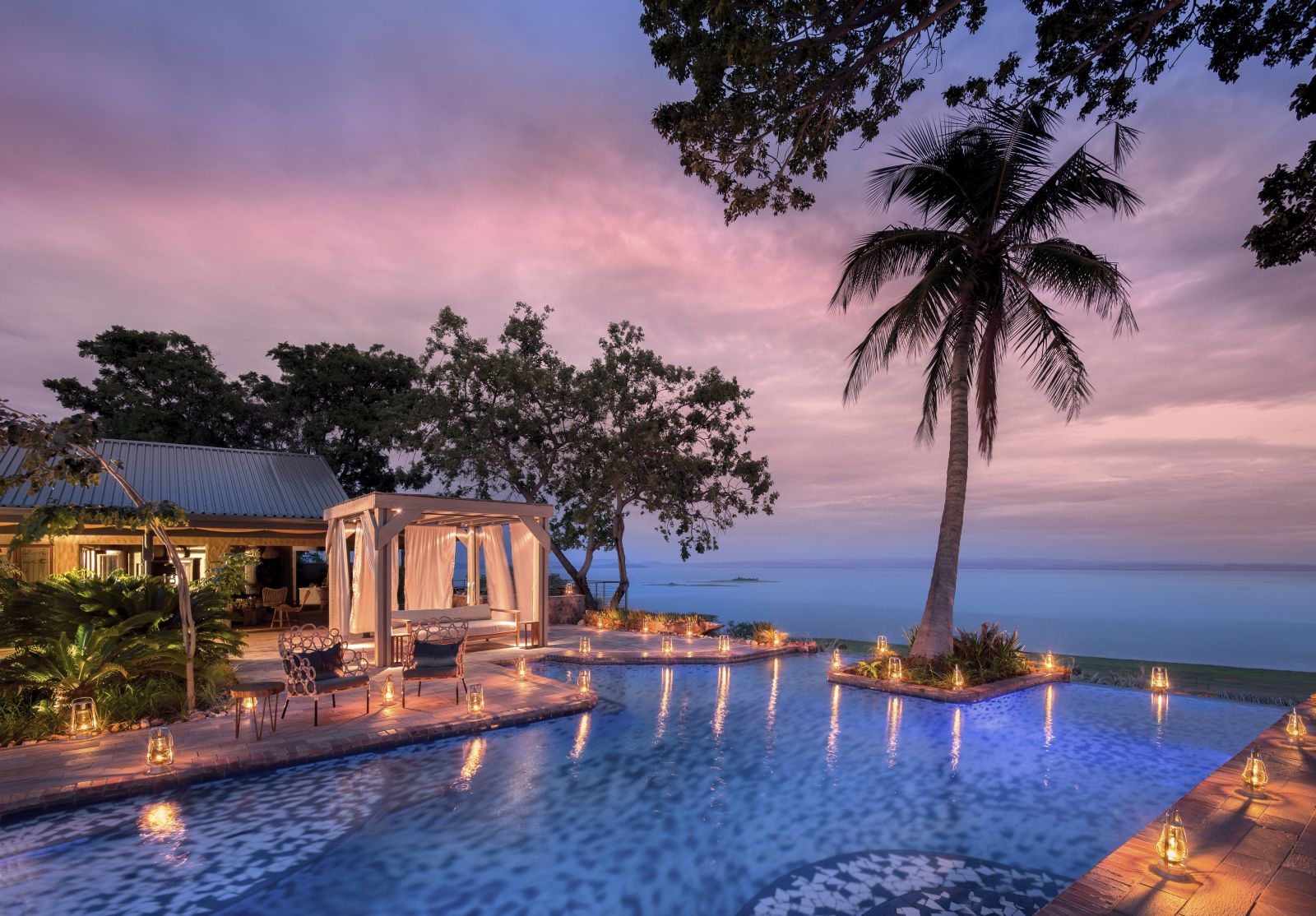 Infinity pool in front of one of the ten lakeview rooms at Bumi Hills Safari Lodge overlooking Lake Kariba at sunset