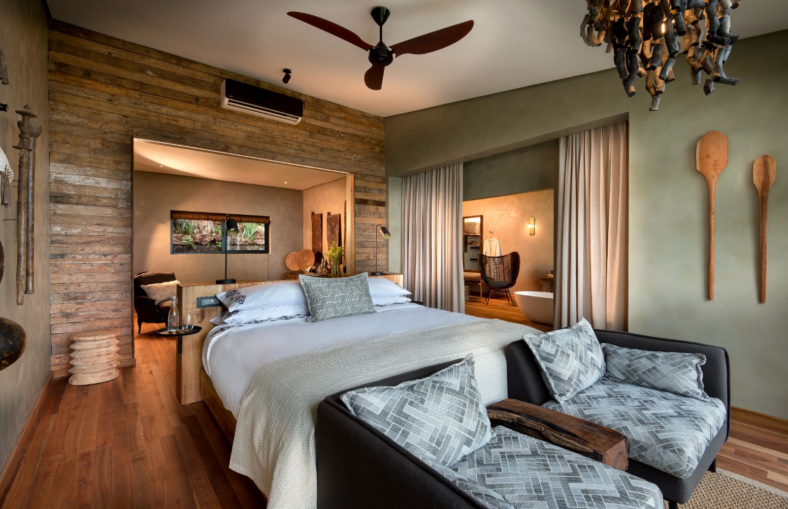 Bedroom of a Kingfisher Cottage at luxury safari lodge Bumi Hills in Zimbabwe