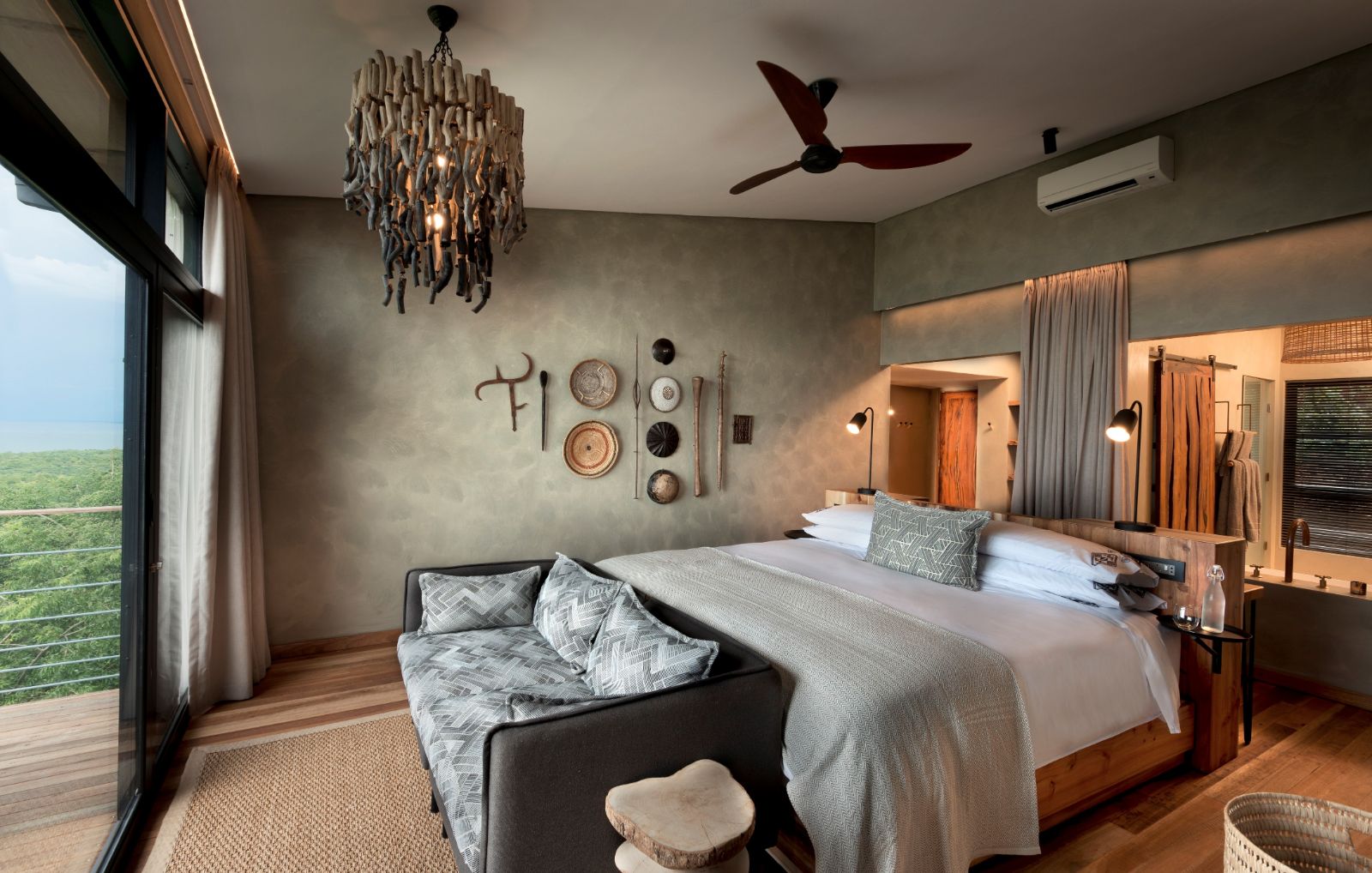 Bedroom of a Lake View Room at luxury safari lodge Bumi Hills in Zimbabwe