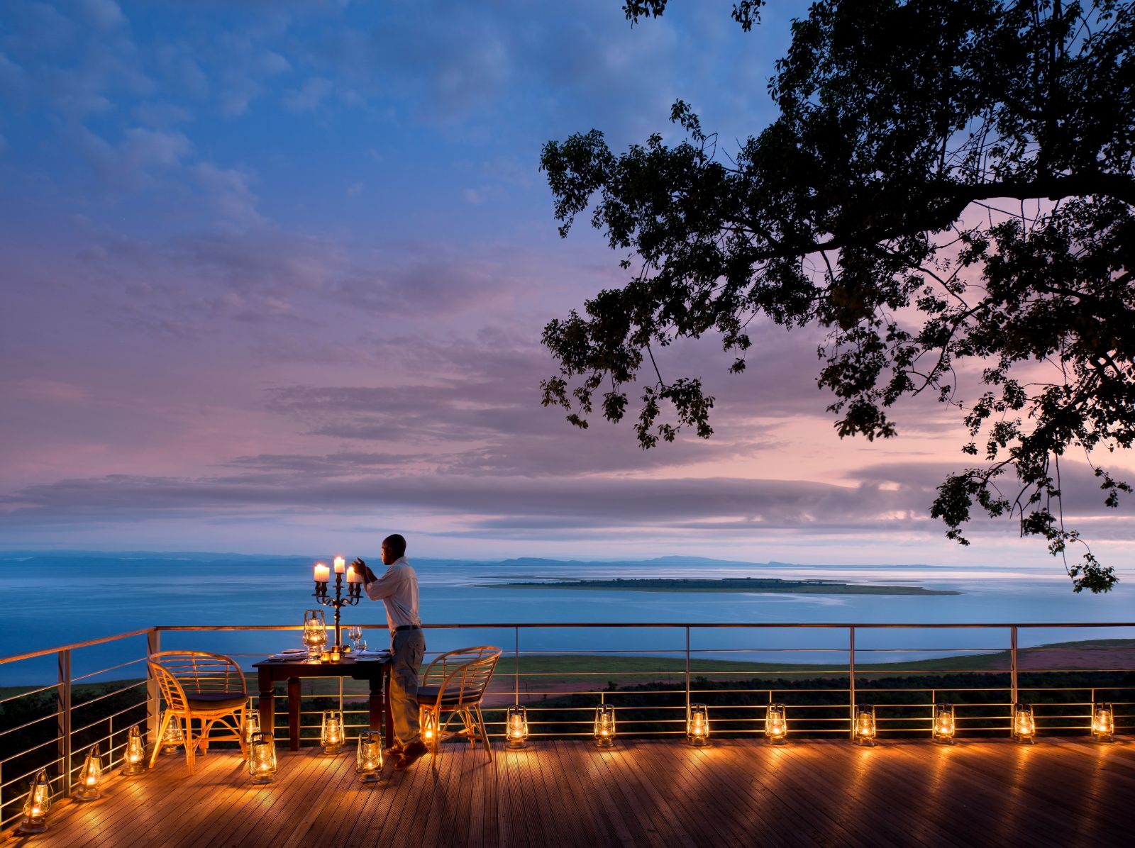 Private dinner set up on the deck at luxury safari lodge Bumi Hills in Zimbabwe