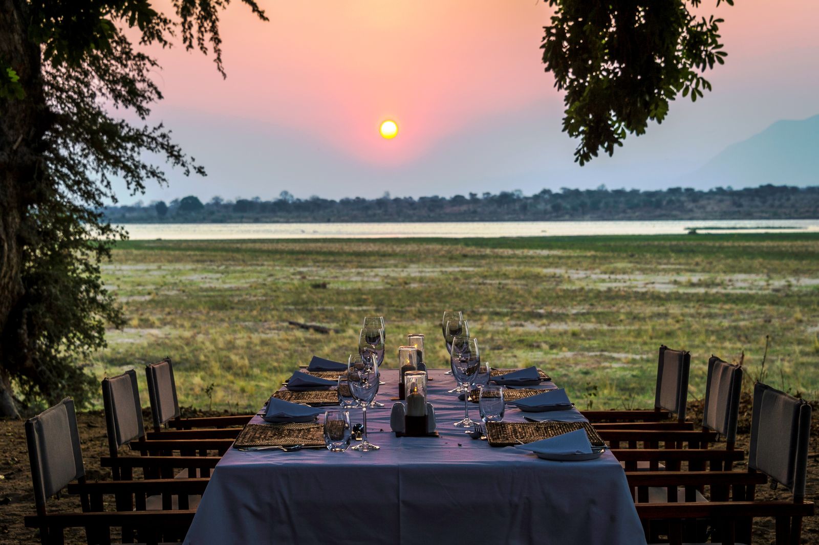 Little Ruckomechi - dining outside - river view