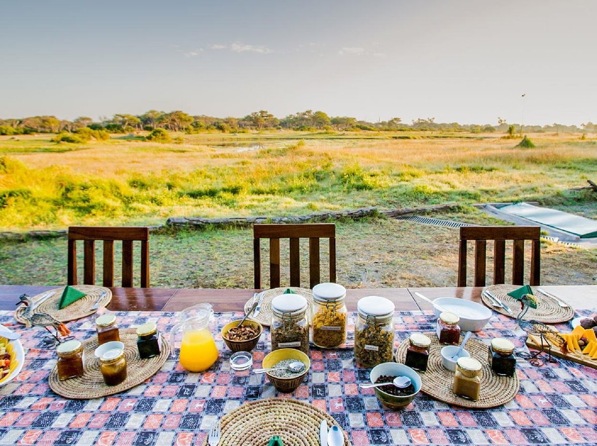 Breakfast overlooking the Hwange plains at The Hide safari lodge Zimbabwe