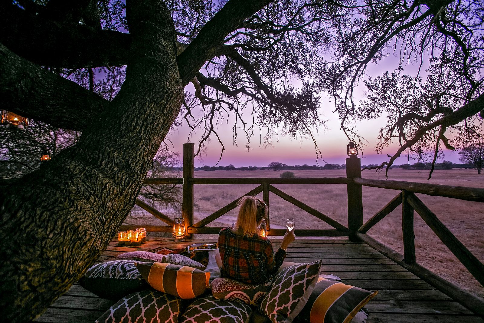 Dusk on the Doves Nest treehouse terrace at The Hide safari lodge Zimbabwe