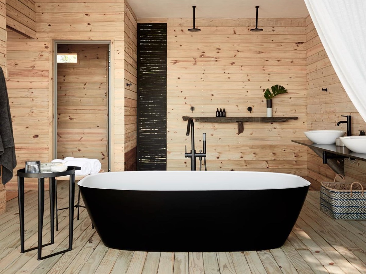 Starbed treehouse freestanding bathtub at Victoria Falls River Lodge in Zambezi National Park in Zimbabwe