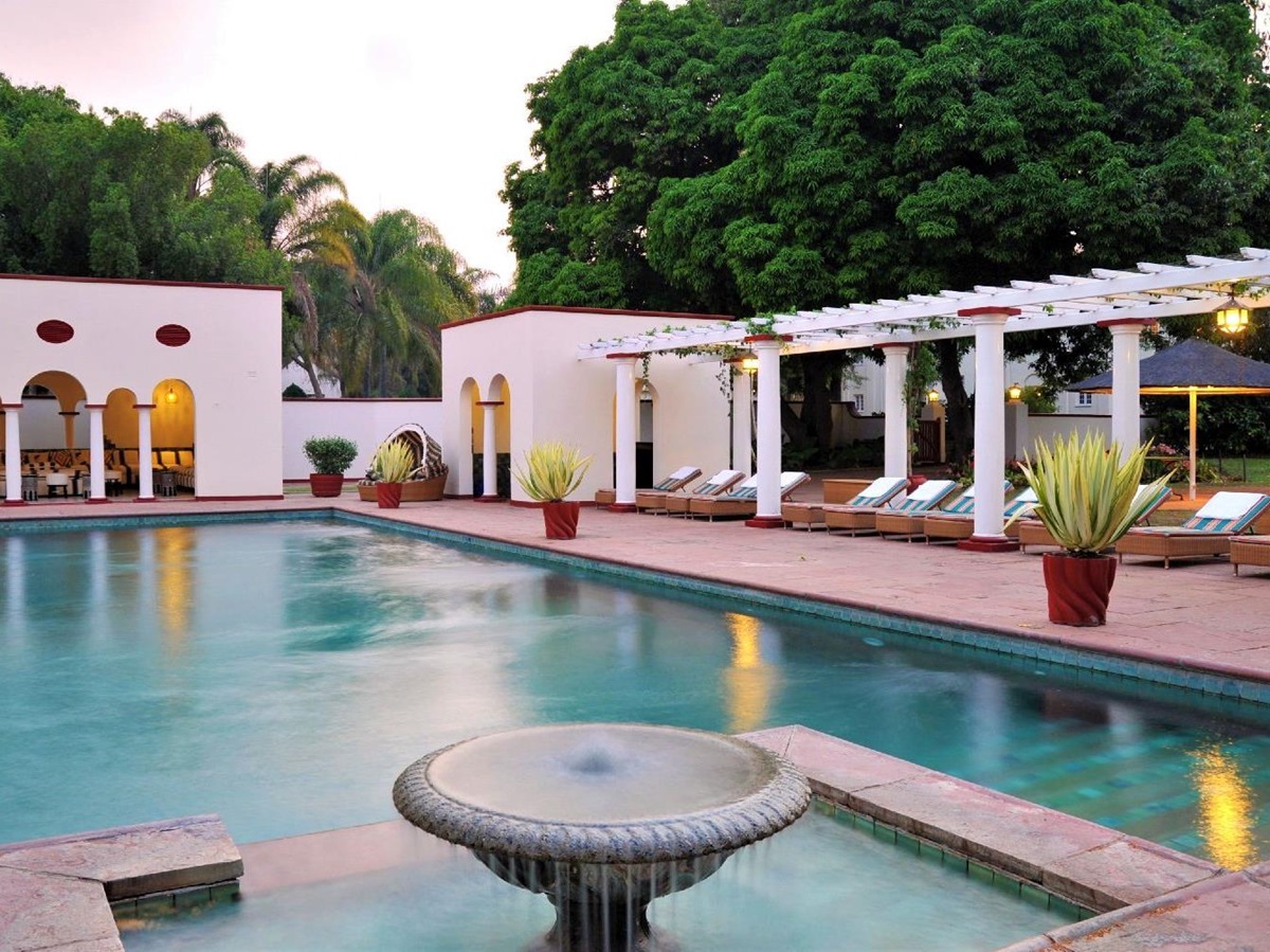 The swimming pool at The Victoria Falls Hotel in Zimbabwe