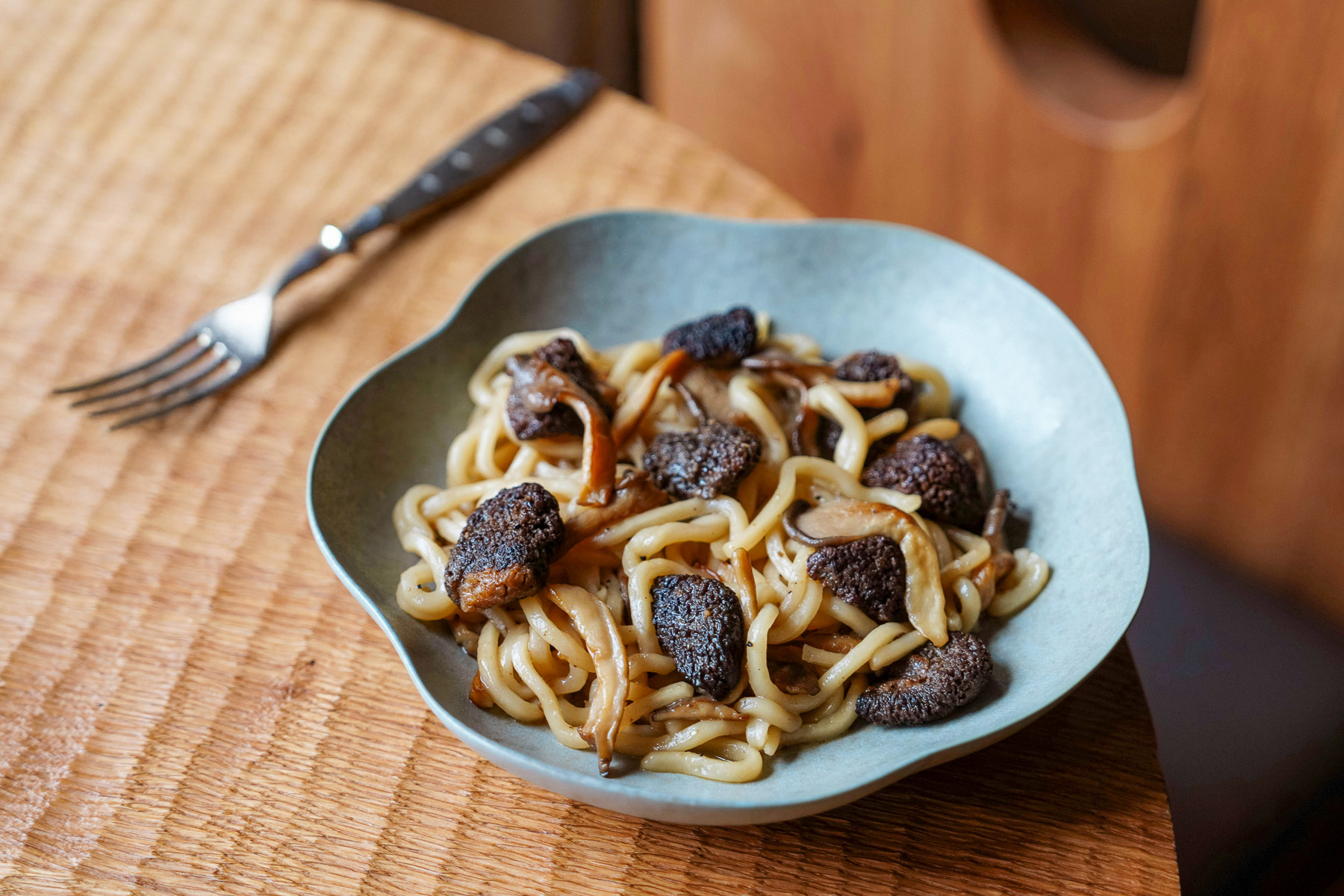 Strangozzi, a traditional Umbrian dish with noodle-like pasta and shaved truffle