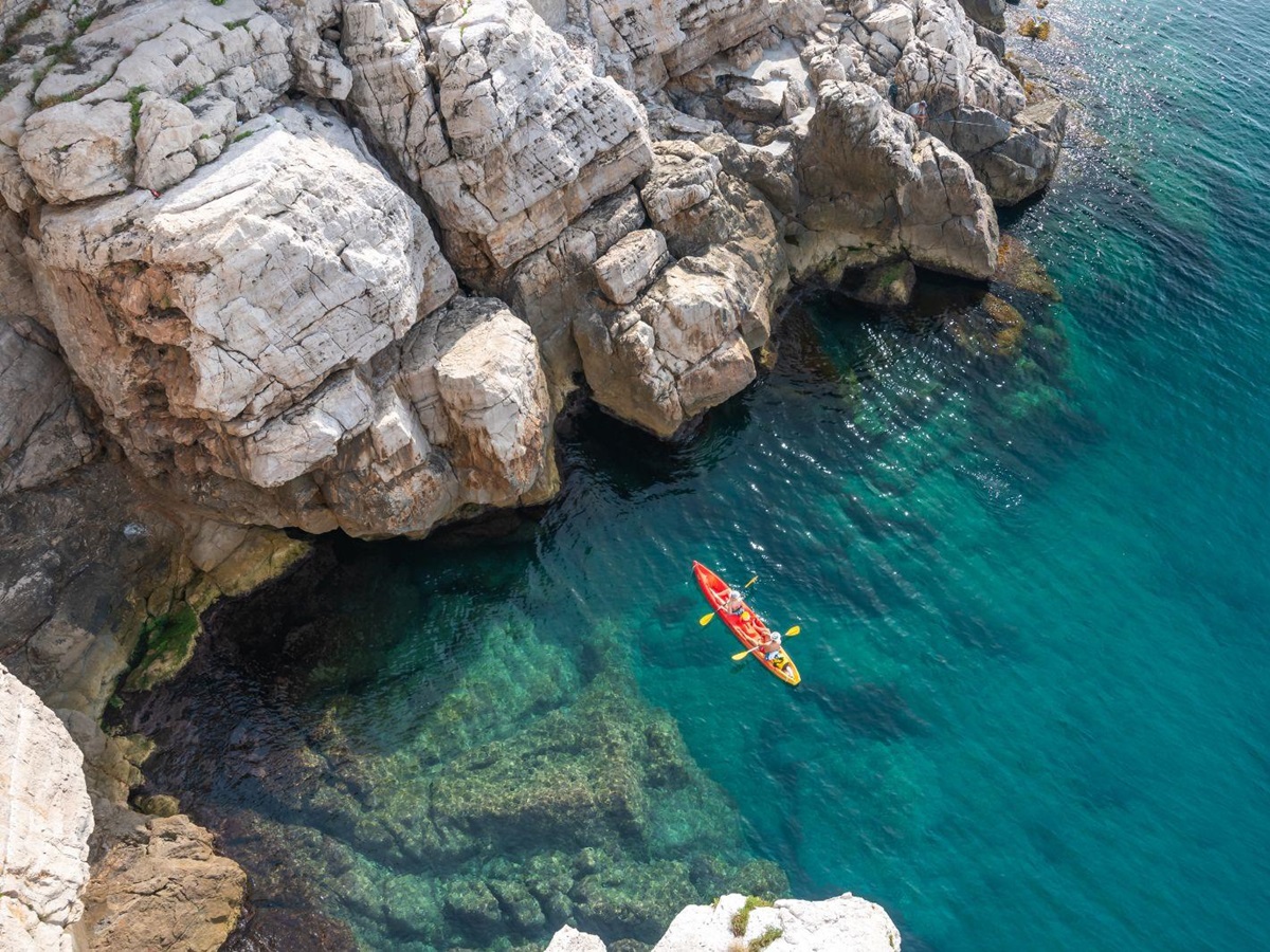 Aerial view of a couple kayaking in the Adriatic