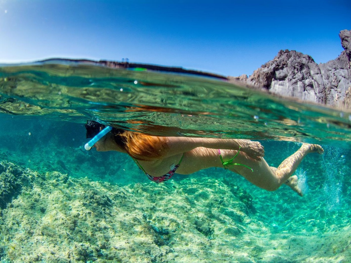 A woman snorkelling in the Mediterranean