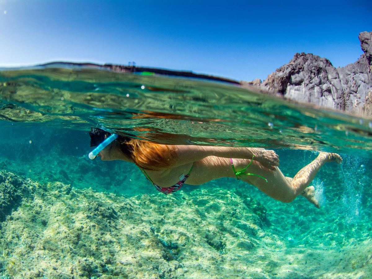 A woman snorkelling in the Mediterranean