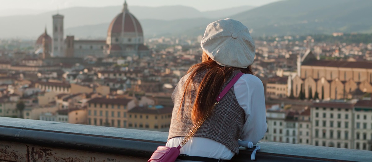 Young tourist overlooking Florence, Tuscany