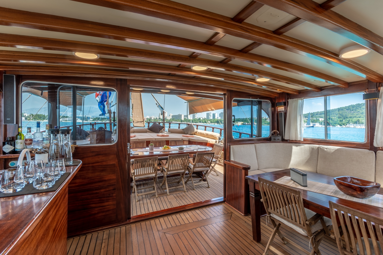 Salon with sitting area and bar onboard the luxury gulet Angelica